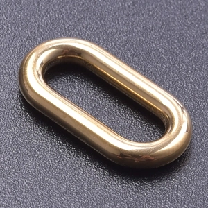 Macro shot of oval 18k gold plated stainless steel necklace connector accessory