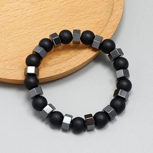 Unisex black hematite beaded stretch bracelet with silver geometric metal accents