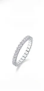 Macro detail of S925 sterling silver eternity ring set with round Moissanite stones