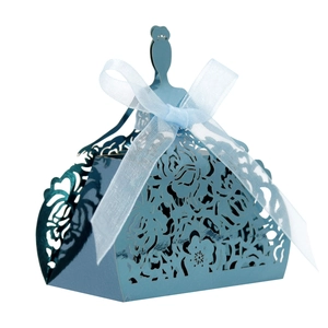 Detail of laser-cut princess dress candy box in metallic blue with blue organza ribbon