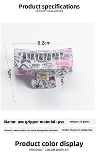 Detailed view of PVC hair claw clip showing 8.2cm dimensions and angel heart pattern