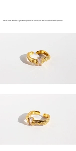Detail view of gold lava texture ring with emerald-cut cubic zirconia stone