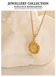 Detail of French vintage gold necklace with Elizabeth II relief coin pendant and chain
