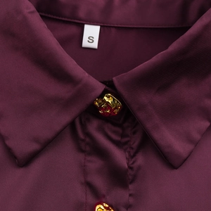 Elegant purple satin shirt for women with gold buttons and sophisticated lapel collar