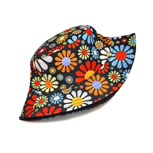 Floral print bucket hat with colorful daisy patterns on black breathable cotton fabric