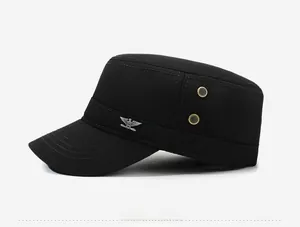 Close-up of black canvas military flat top hat with silver eagle badge and metal eyelets