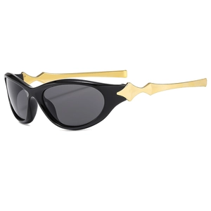 Retro Y2K cat-eye cycling sunglasses with black frames and gold geometric temples