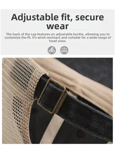 Details der verstellbaren Bronzeschnalle und des beigen Mesh-Netzes der Baseballkappe