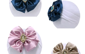 Detail of infant nylon headbands featuring satin bows and sparkling rhinestone centers