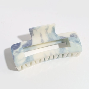 Fashionable hollow square hair claw clip featuring classic blue and white floral ink patterns