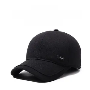 Close-up of black fleece-lined baseball cap showing earmuffs and Sport logo detail