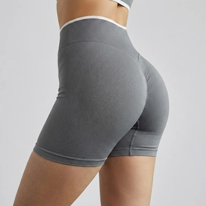 Close-up of high-waist seamless yoga shorts with peach lift effect and ribbed support