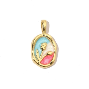 Detail view of 18k gold plated enamel flower pendant with blue and pink floral pattern