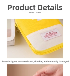 Close-up of bright yellow oxford first-aid pouch with high-quality zipper and woven label