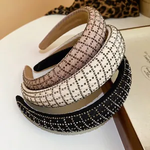 Three-piece set of padded rhinestone mesh headbands in pink, beige, and black colors
