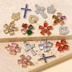Variety of zircon heart clover and cross pendants in gold and silver finish