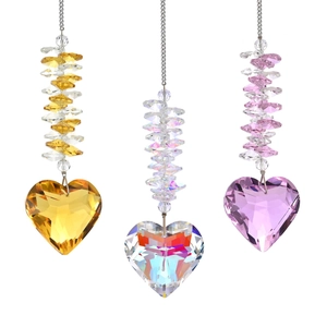 Close-up of heart crystal suncatchers in amber, AB clear, and pink purple hues