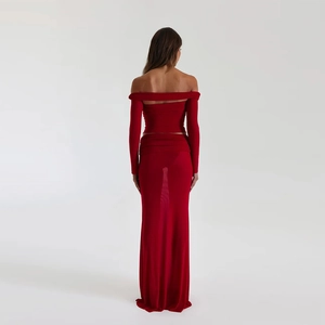 Rear view of red off-shoulder long sleeve dress with backless detail and sheer skirt