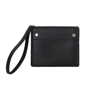 Minimalist black leather coin purse with golden rivets and a matching wrist strap