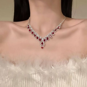 Elegant silver V-shaped necklace with red water drop crystals and tassel diamond fringe