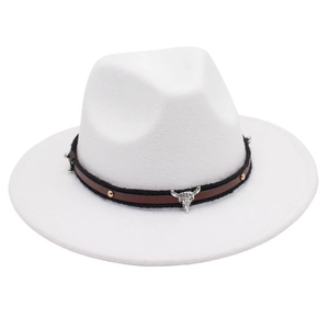 Detail of white wool fedora hat with silver bull head pendant and studded leather band