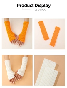 Close-up of ribbed knit arm sleeves in orange and white with thumb hole detail