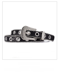 Close-up of sparkling rhinestones on y2k belt buckle and silver eyelet details