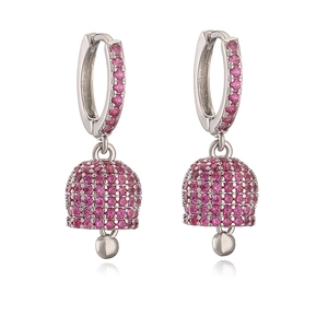 Close-up of silver bell earrings with vibrant magenta pavé crystals on a white background