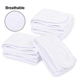 Detail of white breathable fabric headbands with close-up texture for sports and makeup