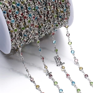 Macro shot of 4.5mm colorful crystal rhinestone chain on spool for DIY jewelry crafts