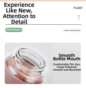 Detail of a smooth and rounded glass bottle mouth with a premium pink protective sleeve