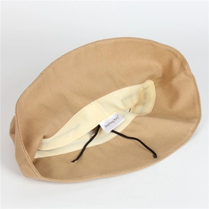 Light brown UV protection sun hat with adjustable strap and inner sweatband for babies
