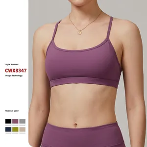 Purple strappy sports bra with U-neckline and matching high-waist leggings for yoga