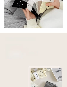 Detail of polka dot combed cotton socks with comfortable rolled edges in neutral tones