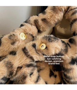 Detail of the leopard print faux fur tote bag featuring a polished gold magnetic snap closure