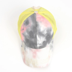 Detailed tie-dye pattern on front panel and neon yellow breathable mesh of baseball cap