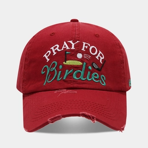 Distressed red baseball cap with PRAY FOR Birdies golf embroidery and frayed brim detail