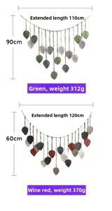 Detail of woven leaf wall hangings showing green and multi-color cotton fringe textures