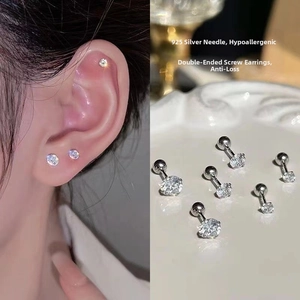 Close-up of 925 sterling silver screw back stud earrings with cubic zirconia