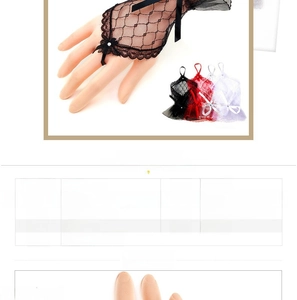 Detail view of lace mesh gloves with bow and diamond accents for bridal or costumes