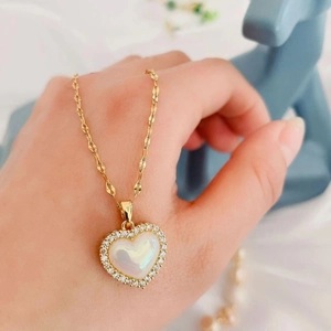 Golden titanium steel heart necklace with iridescent pearl and sparkling rhinestones for women