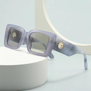 Modern oversized square sunglasses with purple marble texture and gold ring temple details
