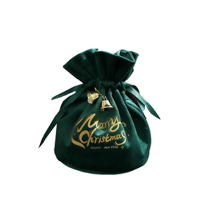 Dark green velvet Christmas drawstring gift bag with gold lettering and small bells