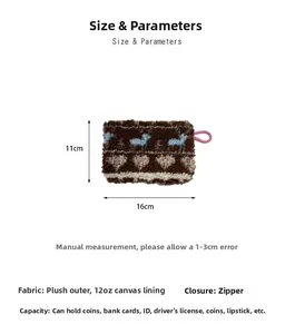 Detail view of 11x16cm plush heart pouch showing size dimensions and zipper closure