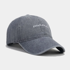 Detail of mama embroidery on vintage washed dark grey cotton baseball cap