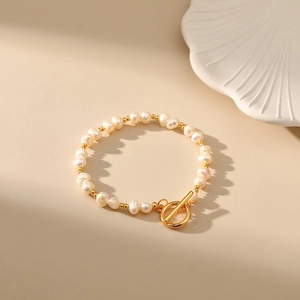 Detail of baroque freshwater pearl bracelet with 18K gold-plated OT toggle clasp closure