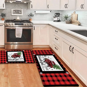 Detail of Christmas buffalo plaid kitchen mat set featuring a vintage red truck and tree