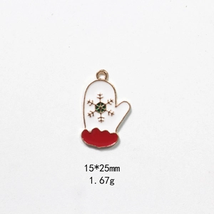 Detail of white enamel glove pendant with golden snowflake, size 15x25mm and 1.67g