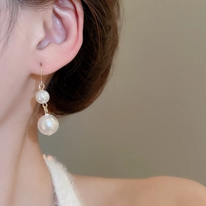 Elegant French style double pearl drop earrings with golden hooks for a sophisticated look