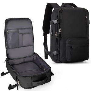 Detail of black nylon backpack interior compartments and external USB charging port